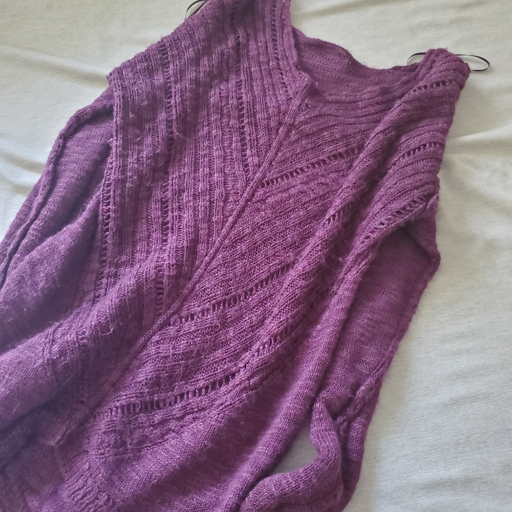 Purple sweater. S.